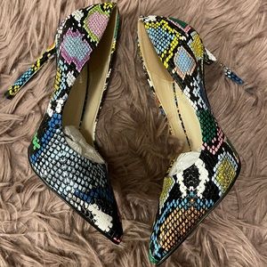 Multicolored pumps. Never worn